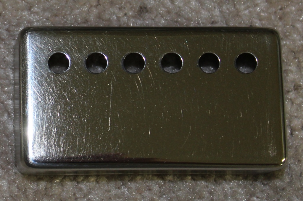 Hand polished unplated pickup cover