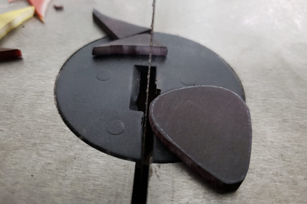 Completed cutting out the guitar pick shape